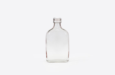 Isolated clear glass bottle white background with clipping path.