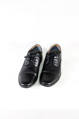 Luxuary man leather black shoe on the white isolation backtground.