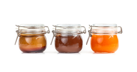 homemade jam in transparent glass jars