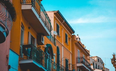 orange apartment building with small balconyorange apartment building with small balcony