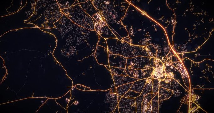 Aerial night view of city of Belfast Ireland UK. Traffic and street light glowing. Camera flying high above, moving around city from space filming cinematic straight down. 3d animation rendering.