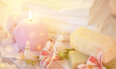 Fototapeta na wymiar Spa treatment health spa candle towel bar of soap orchid aromatherapy