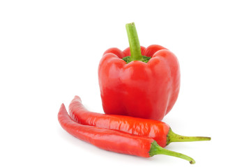 Red paprika and sweet pepper isolated on white background
