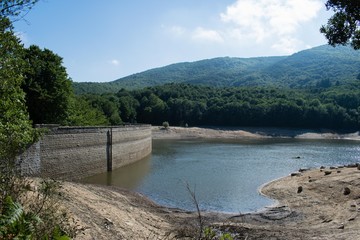 Dried Santa Fe dam, reservoir in Montseny Park at summer, Spain
