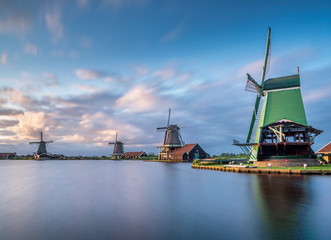 Fototapeta na wymiar Old windmills, Zaanse Schans, Zaanstad, Netherlands