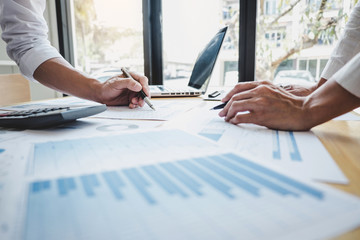 Two business colleague meeting to brainstorm the new project business strategy plan and analysis data document, finance and accounting concept Briefing, brainstorming, consulting