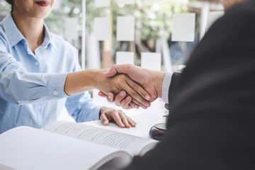 Handshake after good cooperation, Businesswoman Shaking hands with Professional male lawyer after...
