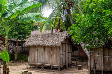 Poor village with wooden cottages  at Lokobe nature strict reserve in Madagascar, Nosy Be, Africa