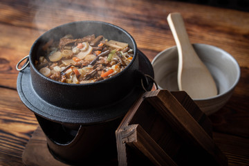 Kamameshi, japanese pot rice with autumn ingredients