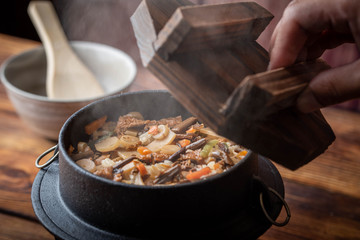 Kamameshi, japanese pot rice with autumn ingredients