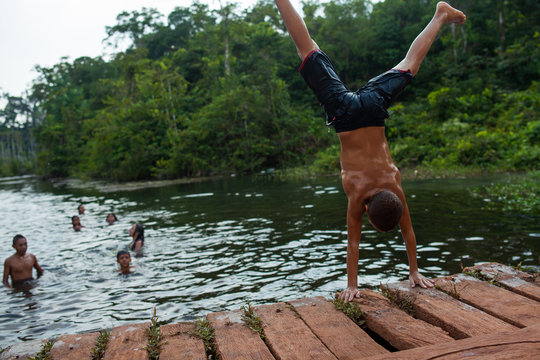 Children playing in a river in the Amazon, Par&aacute; - Brazil