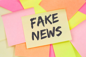 Fake news truth lie media internet online business concept note paper