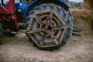 Fototapeta na wymiar Close up of tractor tyre and rim