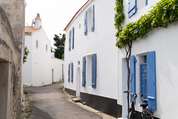 little street with white houses in France Ile de Noirmoutier