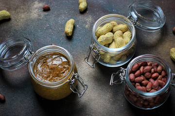 peanut butter in jar and peanuts in a jars