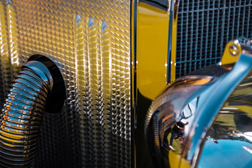 Fototapeta na wymiar Vintage old car exterior detail - grill and hood