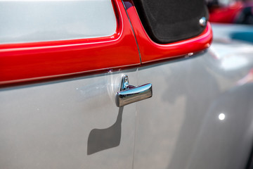 Vintage old car exterior detail - handle