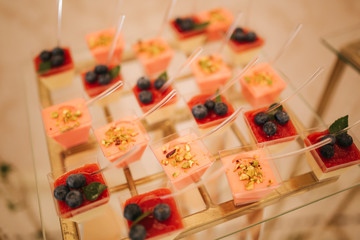 Different dessert on the glass table. sweet