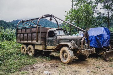 Old truck in the Vietnamese jungle