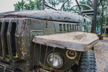 Old truck in the Vietnamese jungle