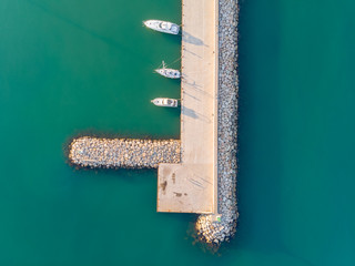 The boats near the pier. L'Ampolla, Catalonia, Spain. Drone photo