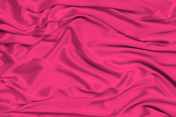 Fototapeta premium silk knitted fabric softly draped with small folds, texture, background, form for postcard, copy space