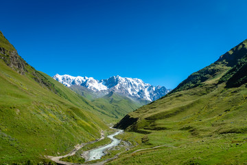 Ushguli landscape with mount Shkhara in the back in Svaneti region, Georgia.
