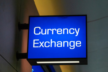 currency exchange sign at the airport with money currency icon for tourist and passenger