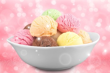 Ice cream scoops in bowl on white background