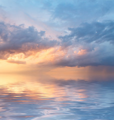 Fototapeta na wymiar background of the dramatic sunset and blue sky and rain 