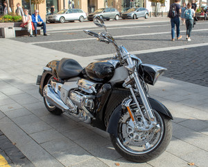 LITHUANIA, VILNIUS - AUGUST 15, 2019:  The biker season is in full swing. A powerful motorcycle is parked in the central square of the city. Editorial