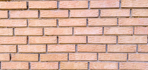 Obraz premium Seamless background of pink bricks for decoration of advertising banners and other design purposes