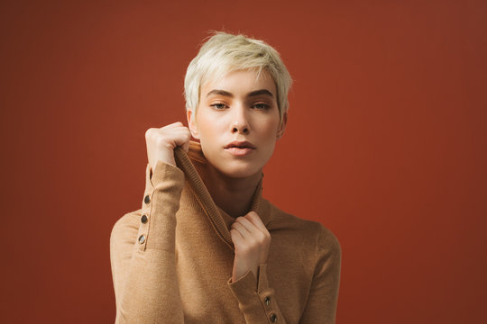 Woman Fashion Model Posing With Turtleneck Sweater