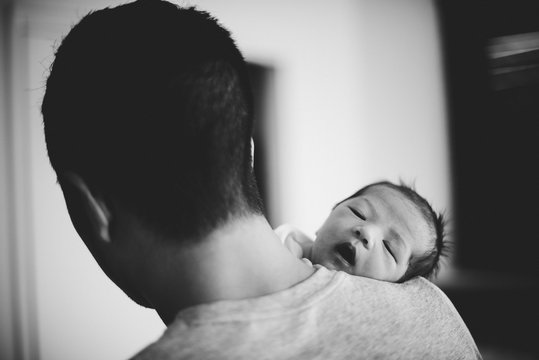 Newborn baby with Dad