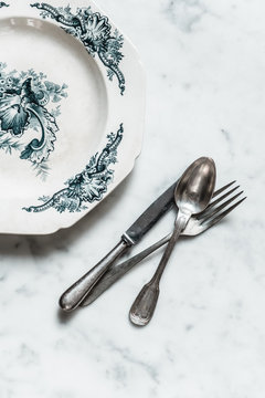 Cutlery and vintage plate