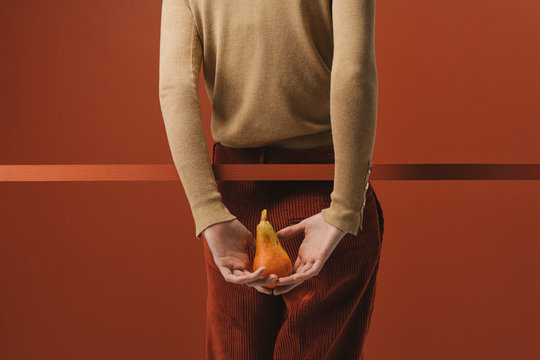 A Woman Holding Pears