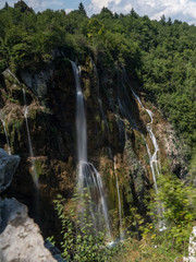 Obraz premium Plitvice Lakes, Croatia, august 2019: The highest waterfall in Croatia, in Plitvicka Jezera UNESCO National park