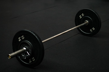 Black metal dumbbell in the gym