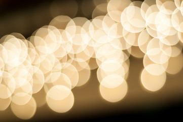 Blurry bokeh of yellow lamps