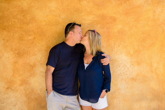 Middle aged married couple kissing
