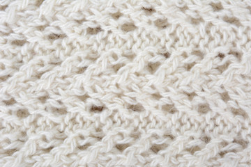 White knitted texture fragment. Handmade women hobby