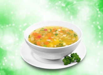 Bowl of delicious vegetables soup on  table