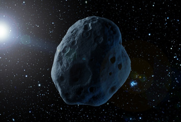A huge asteroid in space, on a dark background.  Elements of this image were furnished by NASA