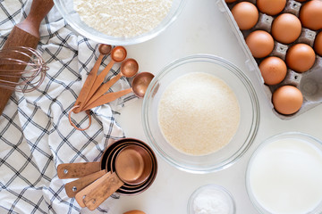 Baking Ingredients with Brown Eggs in Carton
