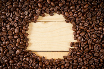 dark background with fragrant brown coffee seeds