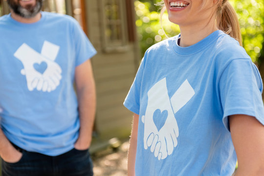 Volunteers smiling and laughing