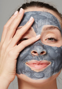 Editorial woman with clay mask