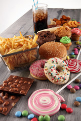 Unhealthy products. food bad for figure, skin, heart and teeth.