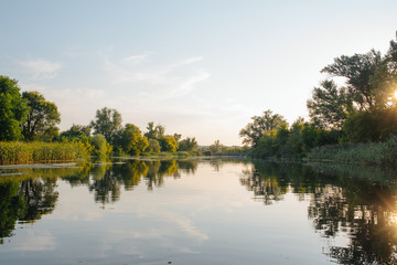 Obraz premium Landscape of nature series. Sunset time on the river.