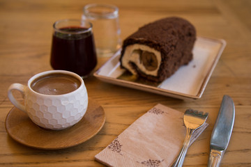the cake and Turkish coffee service concept in the cafe . 